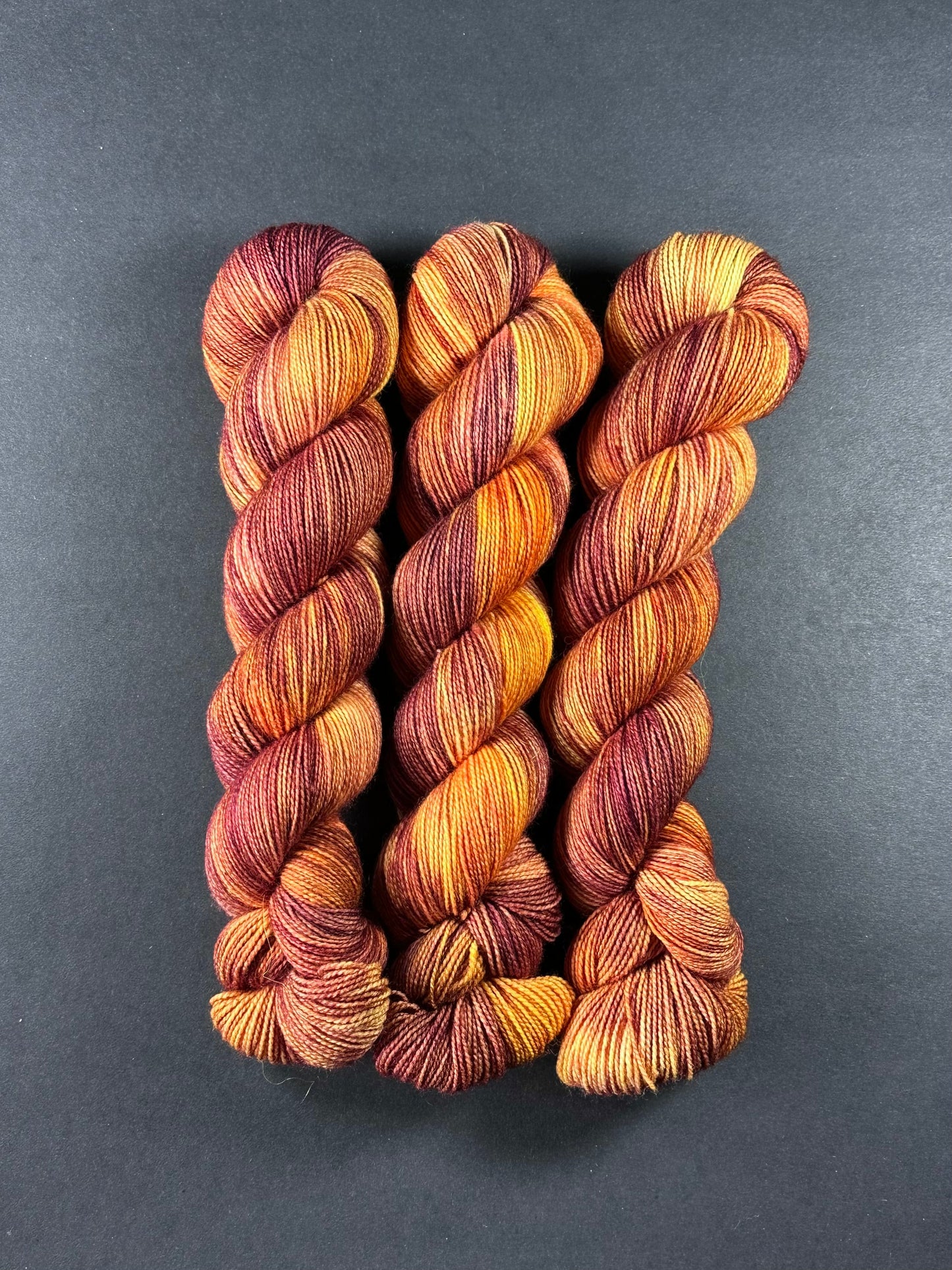 "Blood Orange” Superwash BFL Helix Sock